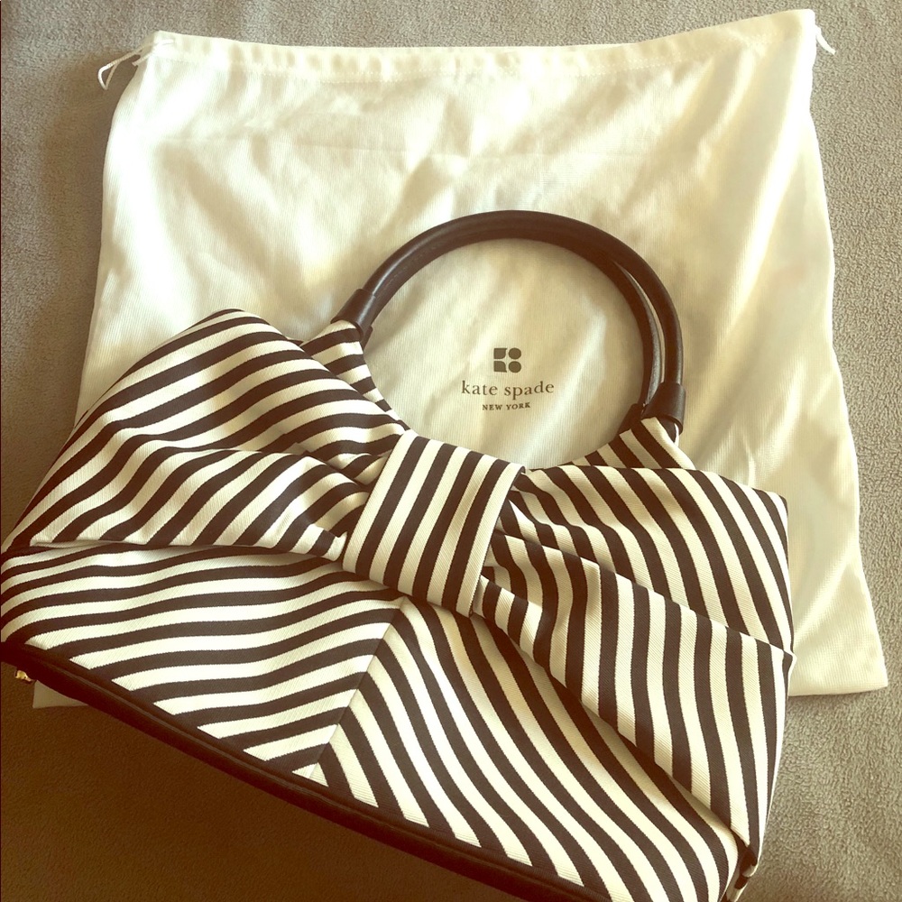 Never been carried Kate Spade purse
